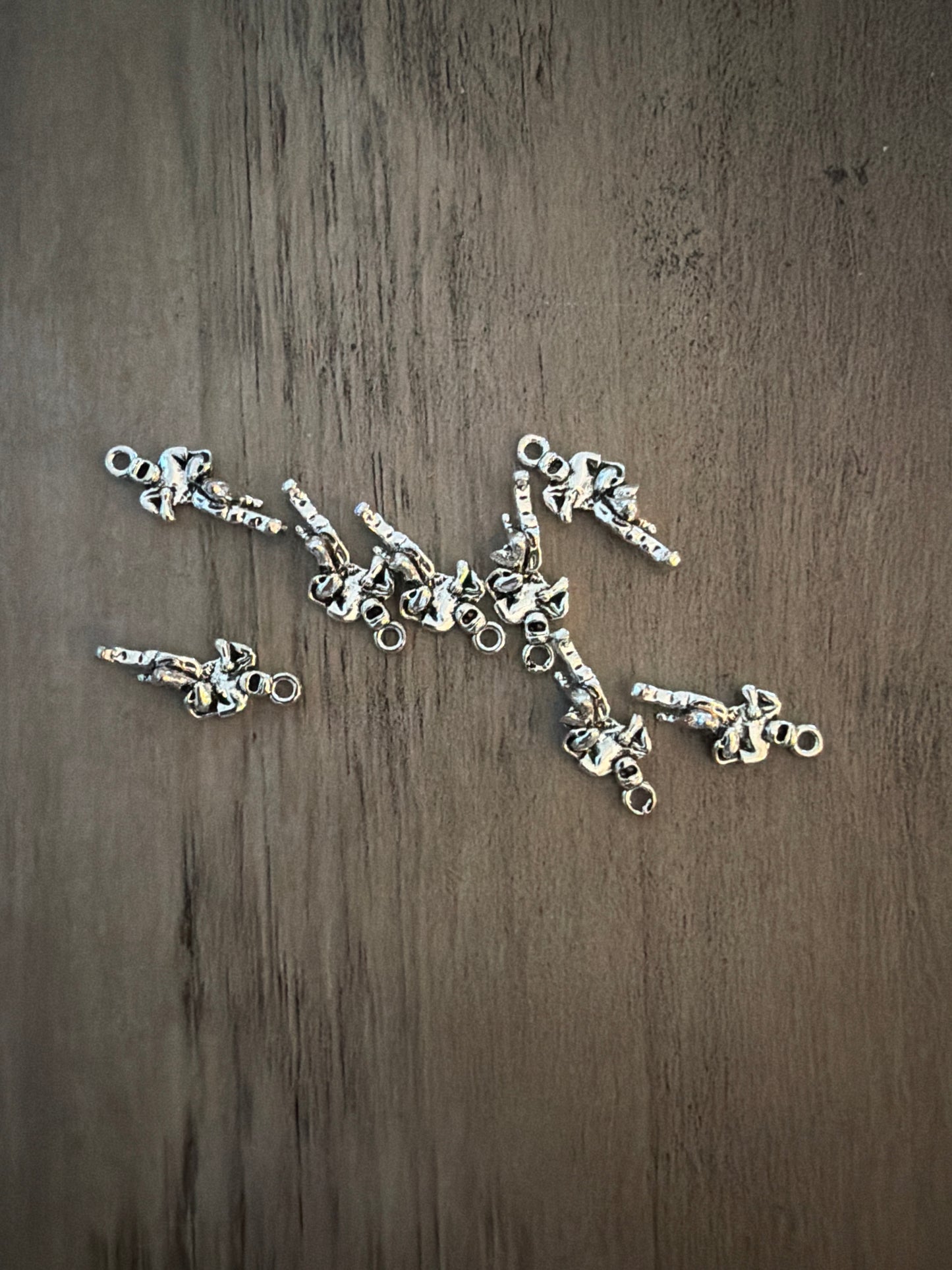 Silver football player running Charm Lot