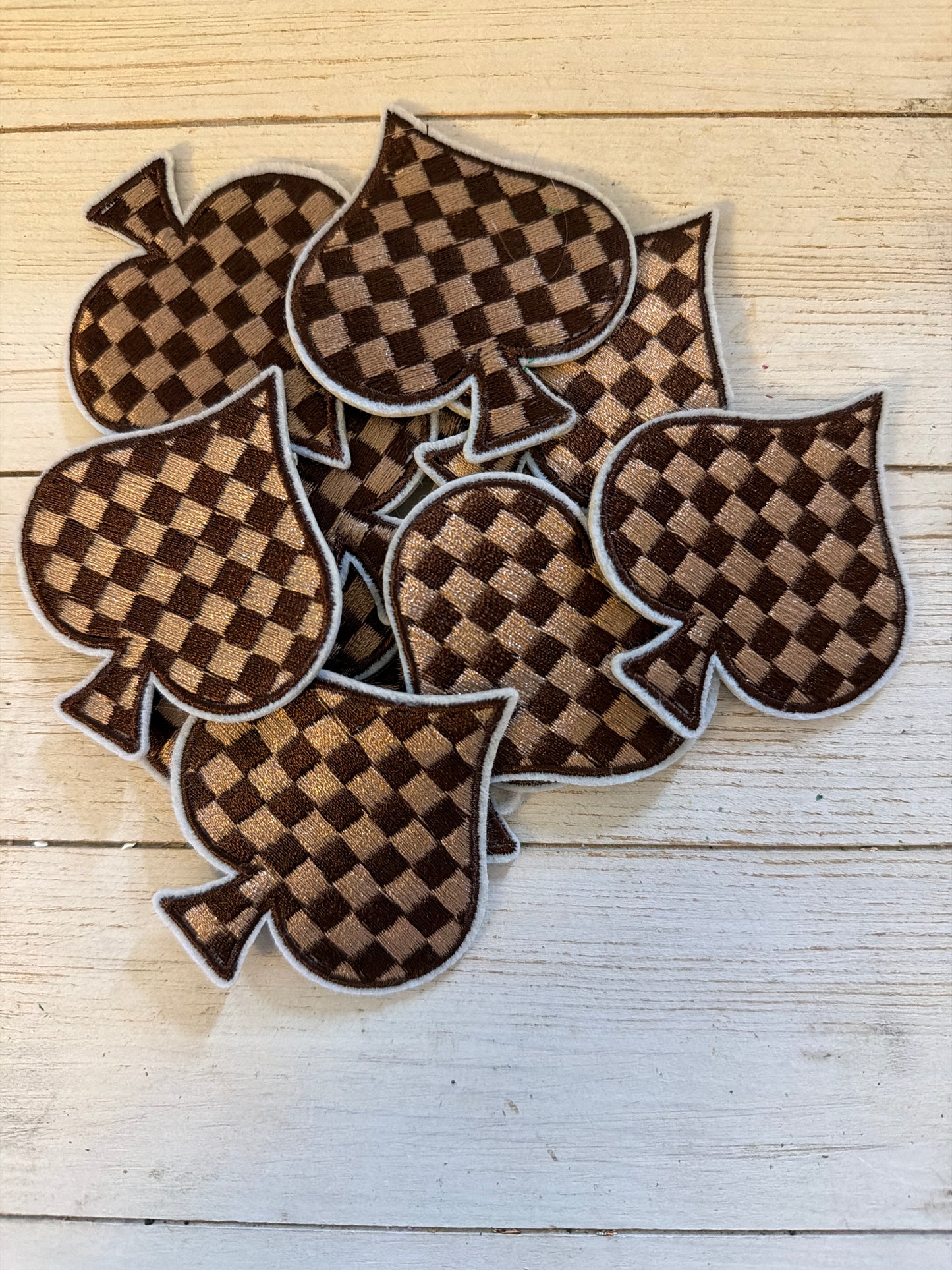 Brown Checkered Spade