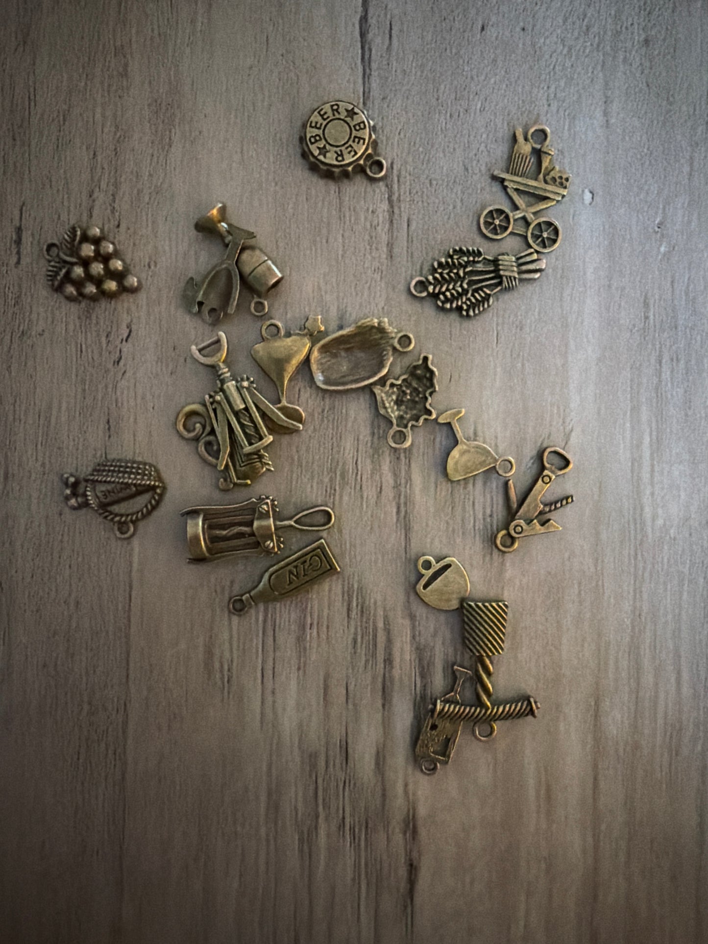 Mixed brass alcohol Charm Lot