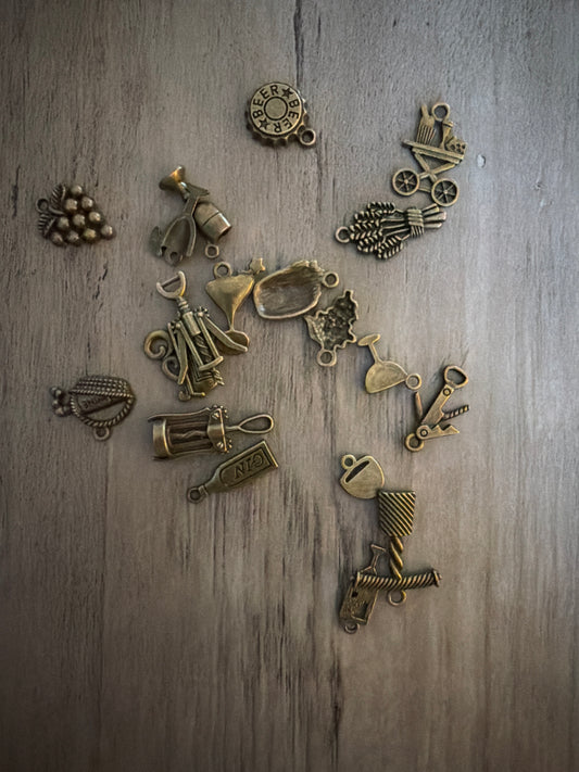 Mixed brass alcohol Charm Lot