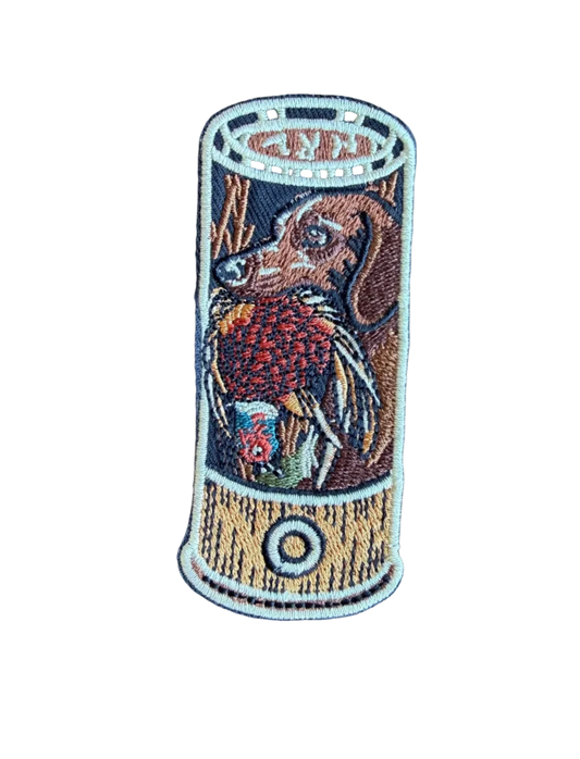 Dog with Duck Shotgun Shell Patch